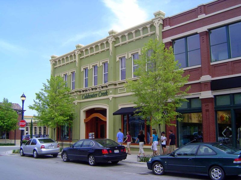 In between the townhouses and the city hall is this instant-heritage commercial development, with offices above stores.