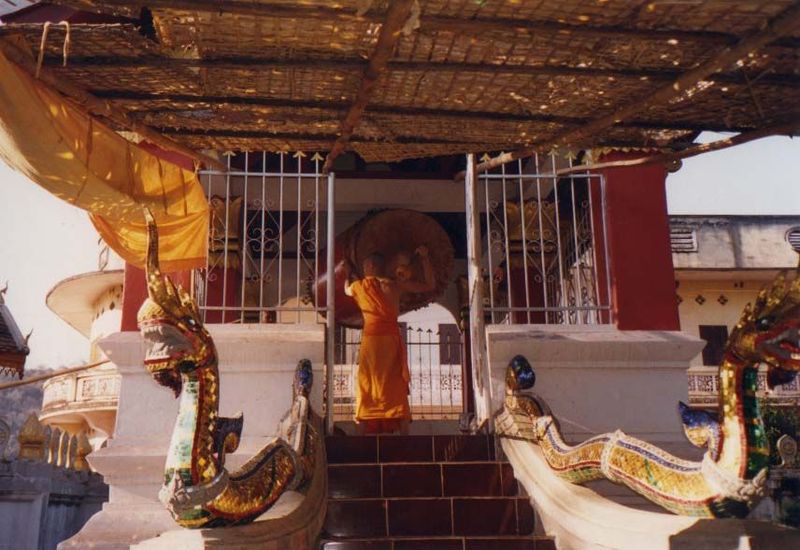 There are many temples close to the river. At several times of day, monks beat immense drums.