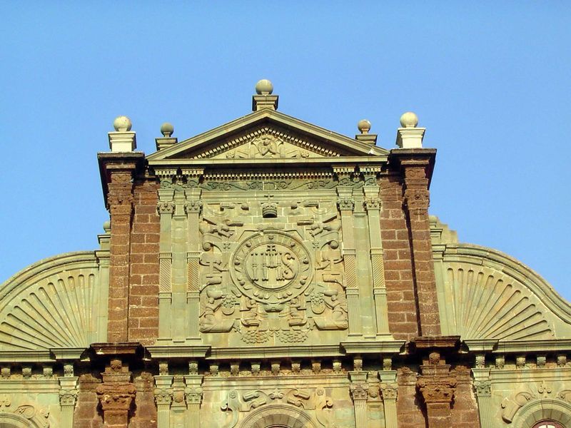 Top of the facade, with the Jesuit seal in granite.