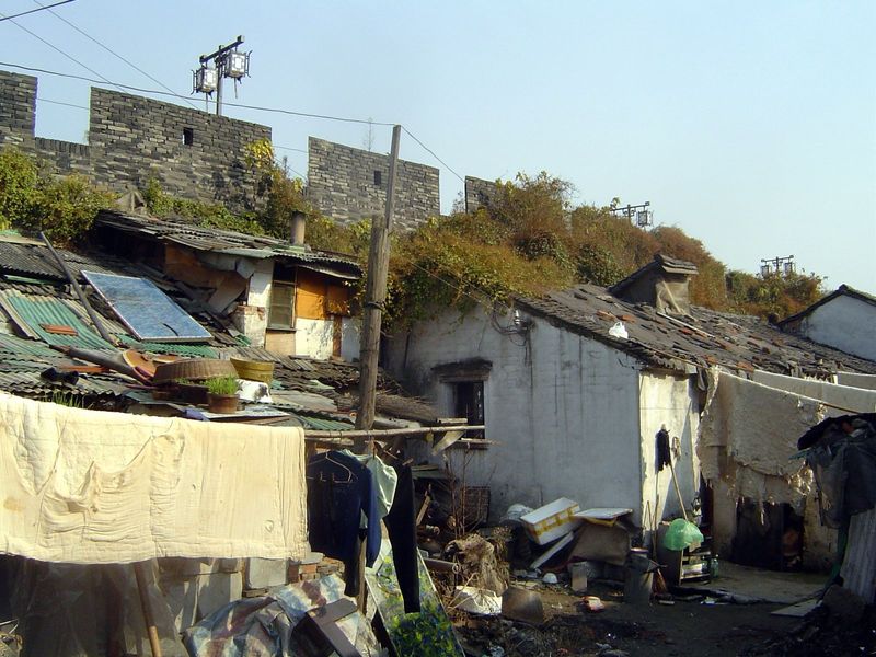 Close to Pan Men, a slum hugs a fragment of the old city wall. It isn't particularly old—the wall was rebuilt in 876, 922, 1662 and other ti
