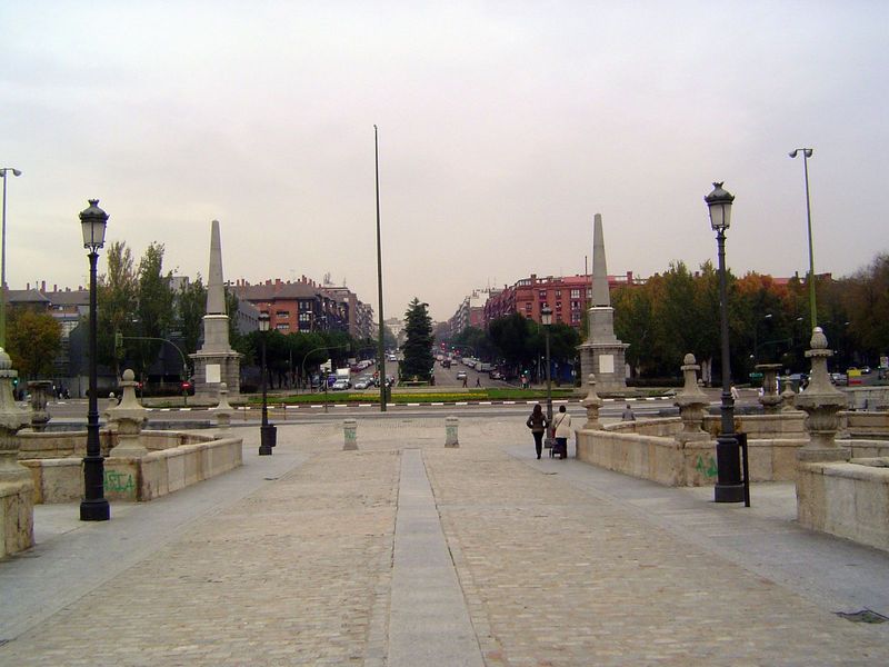 From the east end of the bridge, the Calle Toledo emerges from a tunnel and leads very nearly in a straight line to the center of the city, 
