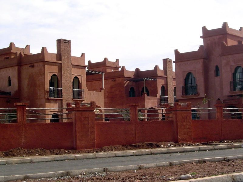 The exteriors are treated with lime and sand; interior floors are marble.