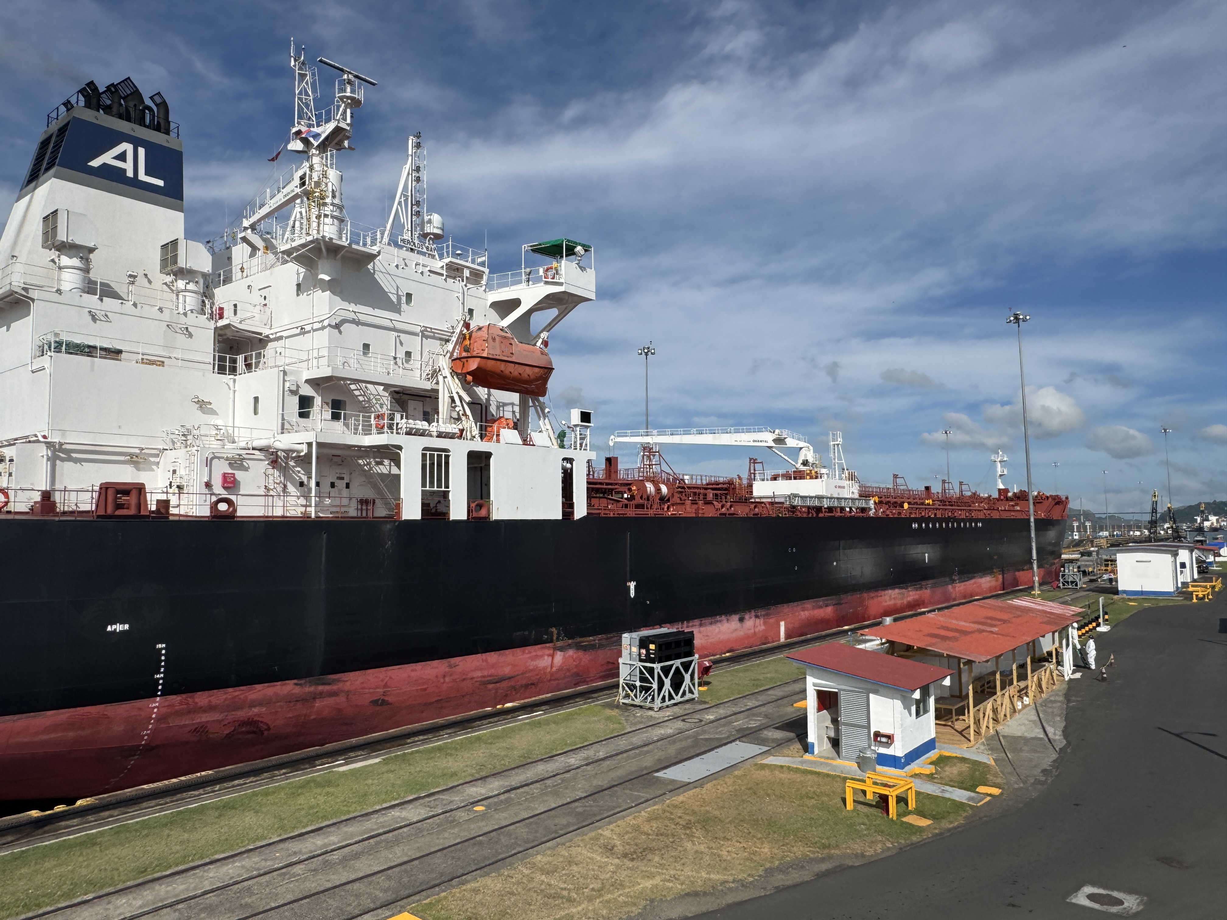 Point your camera carefully, however, and you can exclude the hundreds of people around you and see this tanker as it waits, ever so patient