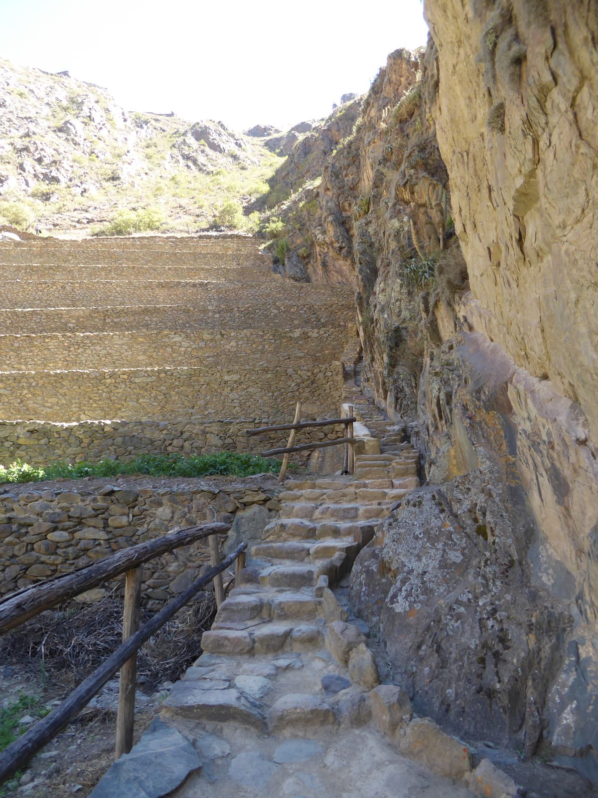 A supply ditch hugs the cliff, and conduits under the path bring water to the terraces, whose walls are permeable by design.