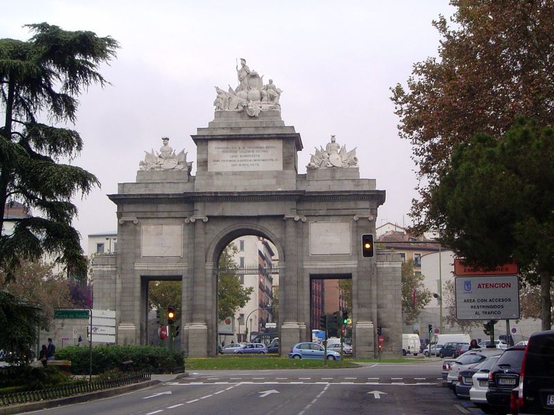 A few minutes' walk from the bridge, this is the Puerta de Toledo. Goitia calls the architect, Antonio Lopez Aguado, a "cold and conventiona