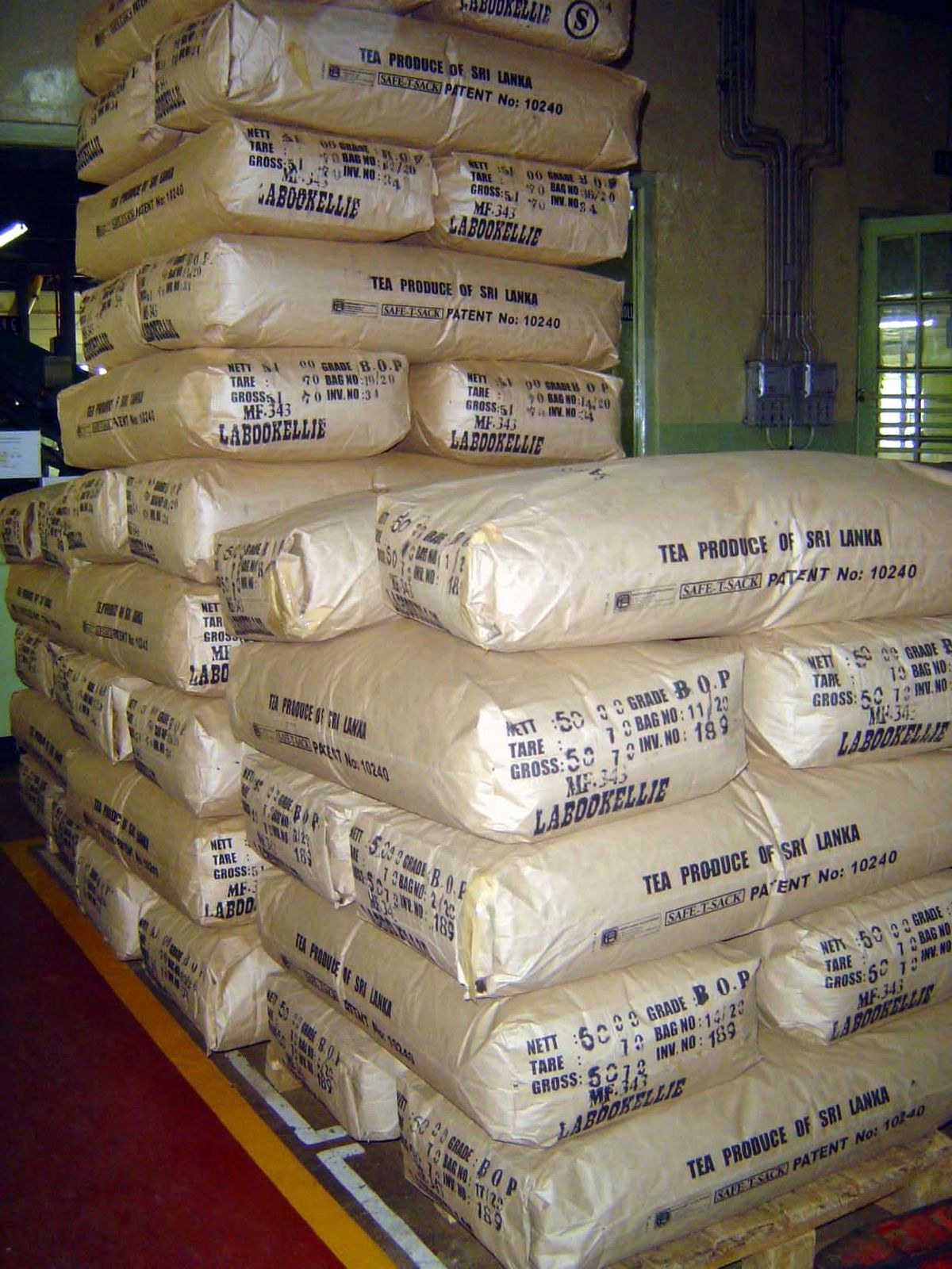 The finished product is stacked in a local tea factory.