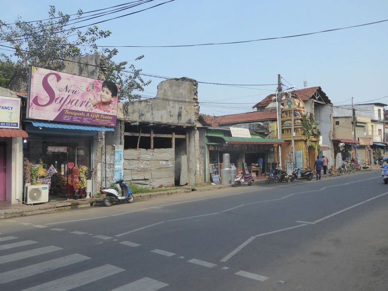 We're on the main road in from the airport and just a block from the intersection with Hospital Road, Jaffna's main street. A temple's been 