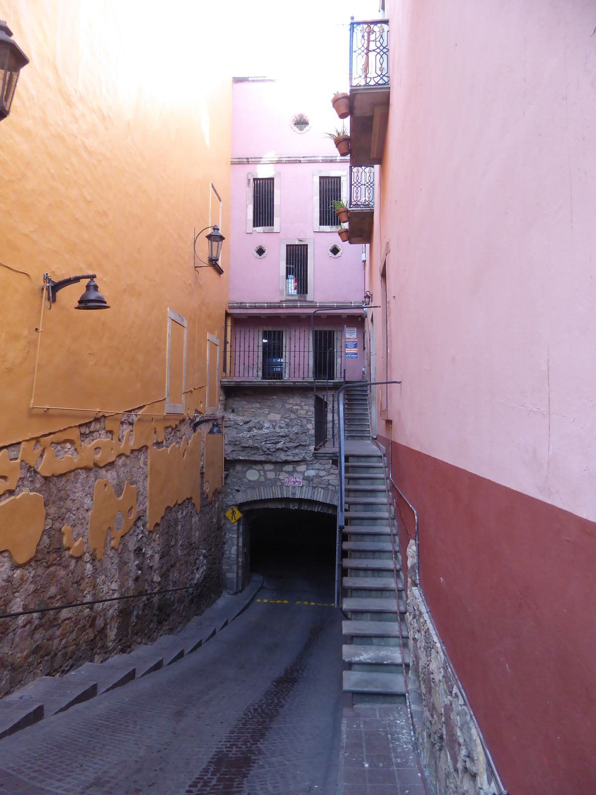 A tunnel rises from under a garage near the Teatro Ju rez.