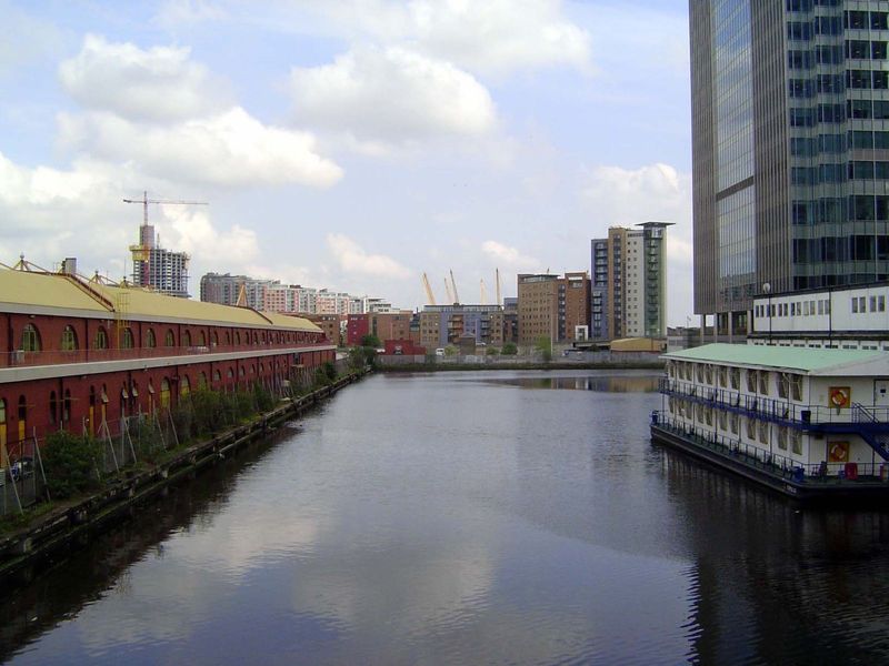 A surviving bit of the West India Docks, with the West India Quay on the left; at its far end is the Billingsgate Fish Market.
