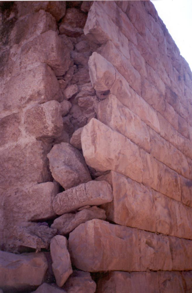 A corner of a wall separates. Can moisture be the culprit, trapped behind the cement used on the wall on the left?
