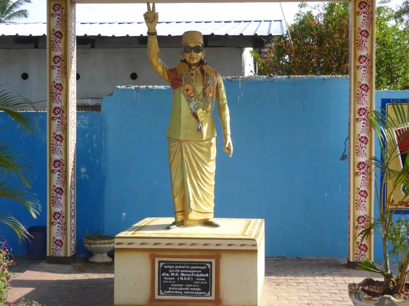 Here he is just across the street in three dimensions and still with his trademark shades. During a decade as Tamil Nadu's chief minister, M