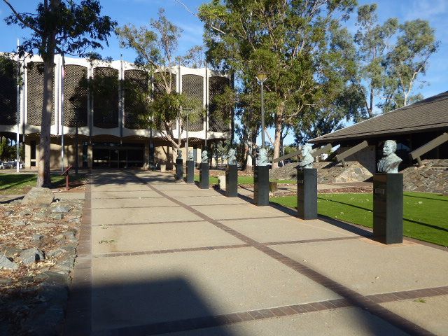 Here's the building that replaced it. Console yourself with the busts of the Syndicate of Seven, the men behind the BHP. Three dropped out i