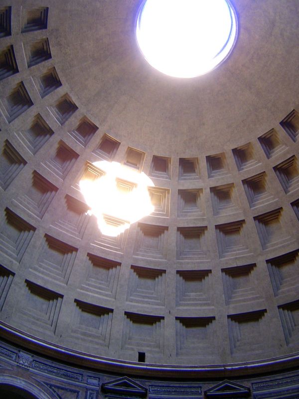 The interior of the dome is a coffered hemisphere. Counter-intuitively, if an inflatable ball were filled to fit the dome the ball would als