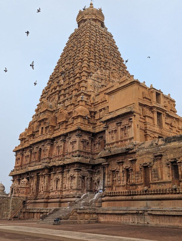 Side view of the exit.  The base is double walled, with an ambulatory path between those walls.  The tower is of stone, unlike gopurams, whi