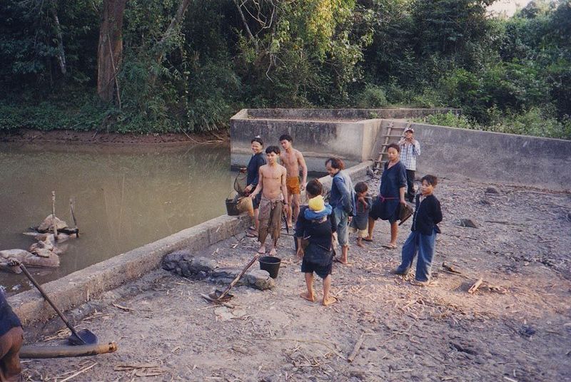 A fuller view, showing villagers about to fish.