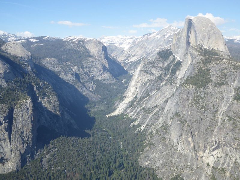 Another iconic view, this time of Half Dome from Glacier Point but hinting at the snowpack along the Sierra crest.