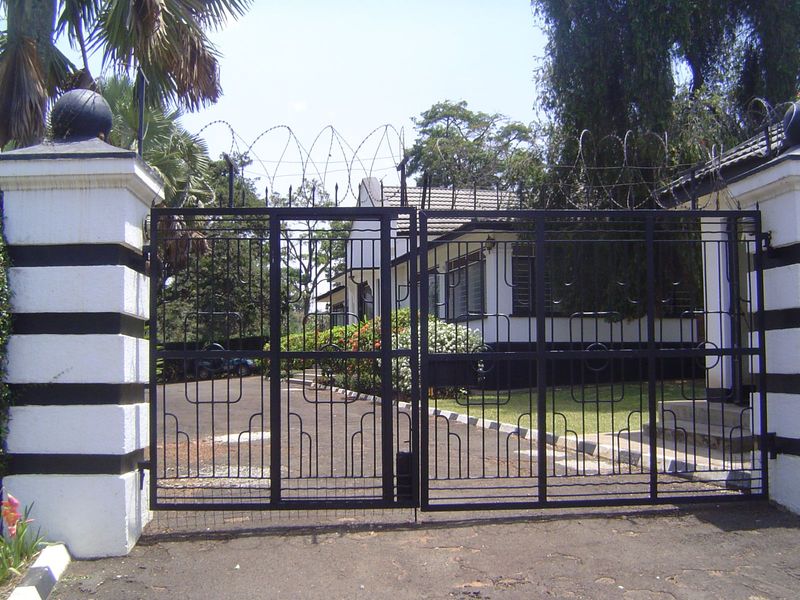 The bungalows are in varying states of maintenance; razor wire is now de rigueur.