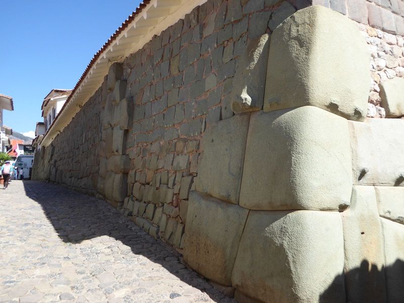 Around the next corner, the wall has broken down at several spots and been rebuilt with astonishing crudity.