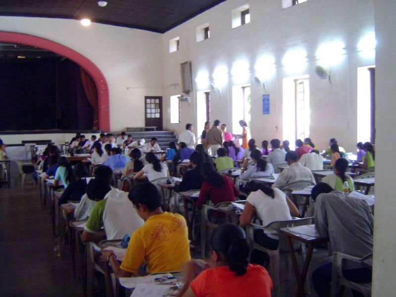 Sitting an exam.