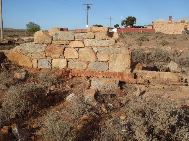 The ruins of the house of the Anglican minister. Would that be bullnose-brick trim?