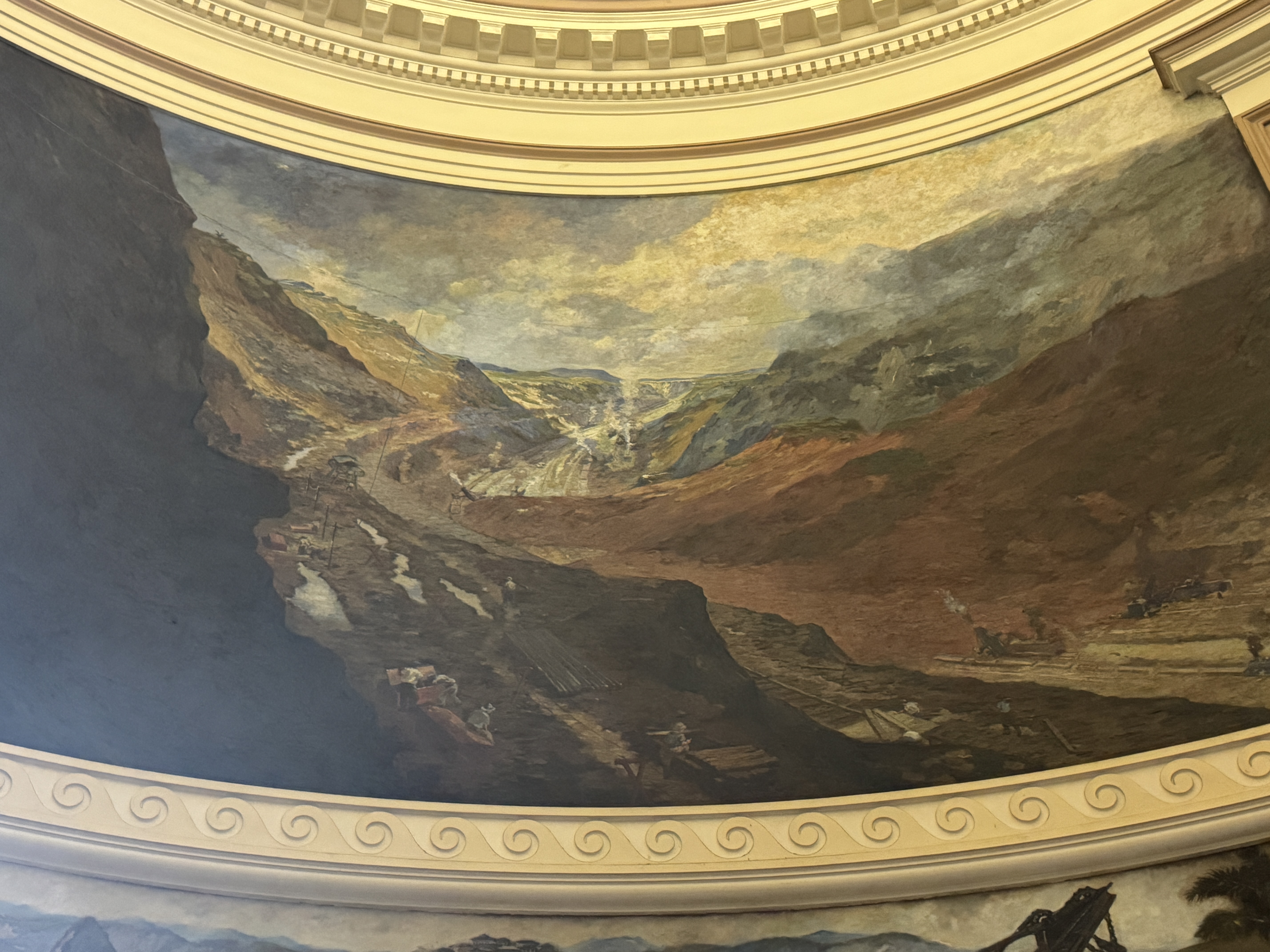 The Cut is celebrated in one of the four murals under the dome of the administration building at Balboa.  The painter was William B. Van Ing