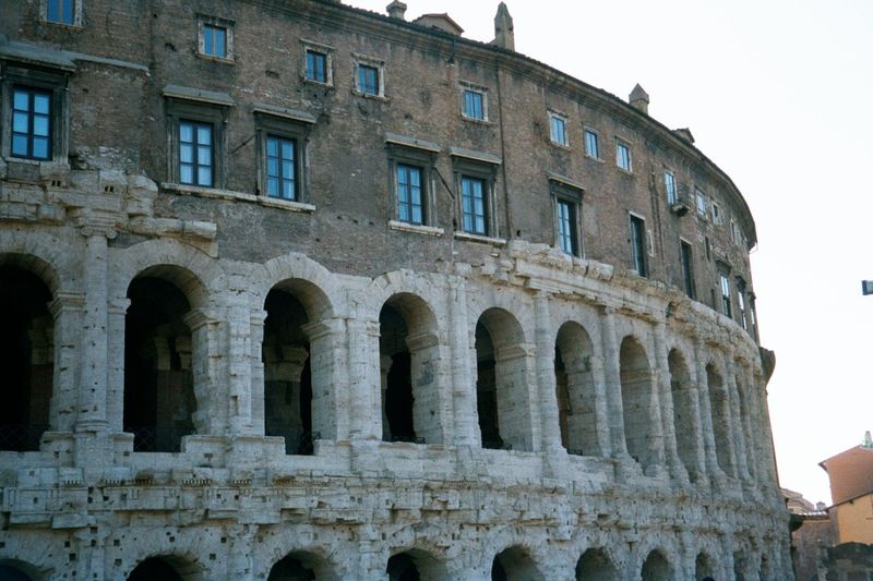 Rising to the Capitoline, the Theater of Marcellus, completed by Augustus and named for his nephew. The rising sequence of orders is Doric a