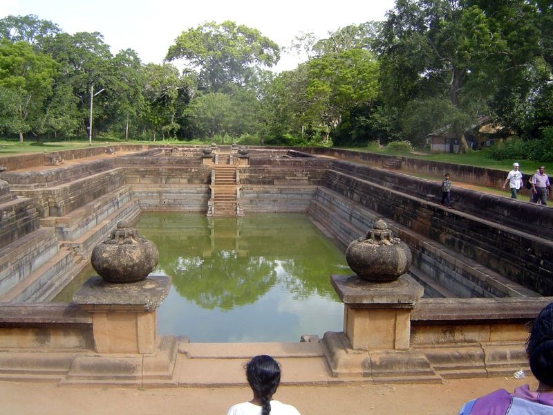 Close to Abhayagiri are the Twin Ponds, Kuttam Pokuna. The walls and floors are of cut granite slabs; buried pipes both filled and drained t