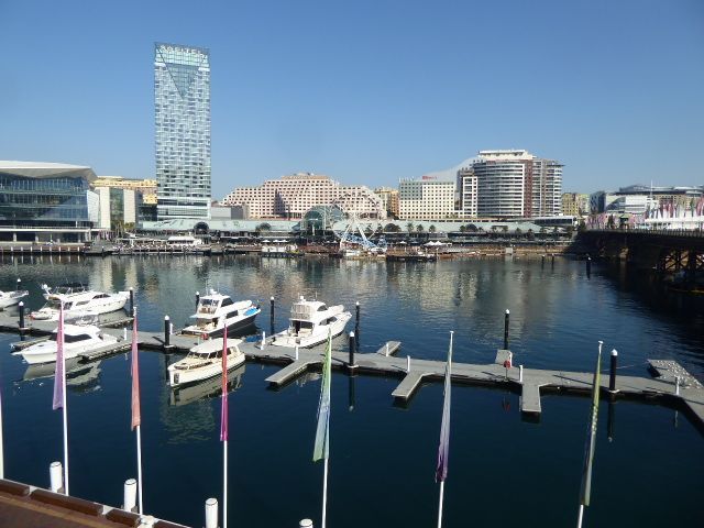 Without the men in suits we couldn't have any fun. That's what we're doing at Darling Harbour on this nice day. That's the Pyrmont neighborh
