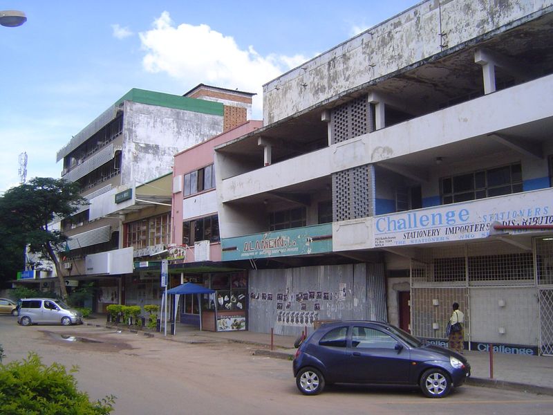 The other side of the street shows how modern buildings can age badly. The decay began with the collapse of copper prices in the 1970s and t