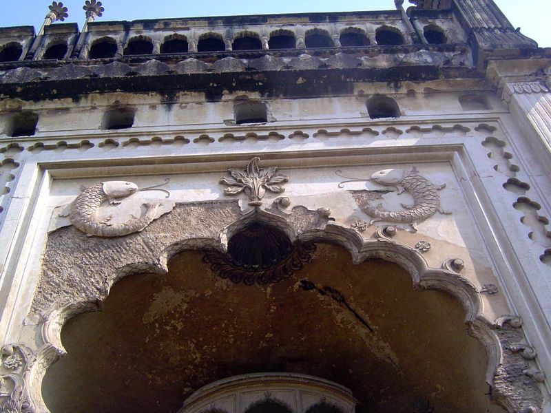 A closer view, revealing the brickwork underneath the plaster.