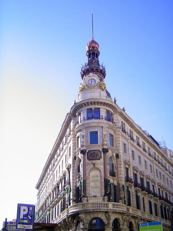 The Banco Español de Credito, or Banesta, was completed in 1891 as the "Palacio de la Equitaiva" for the insurance company of that name. Bef
