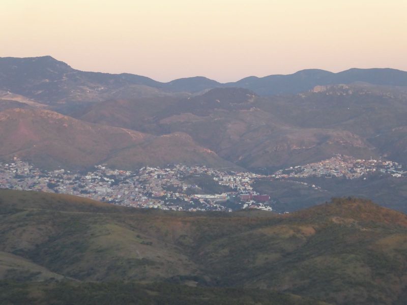 At dusk, near the summit of the mountain, we're catching with a zoom the edge of the city of Guanajuato, which is about seven miles east of