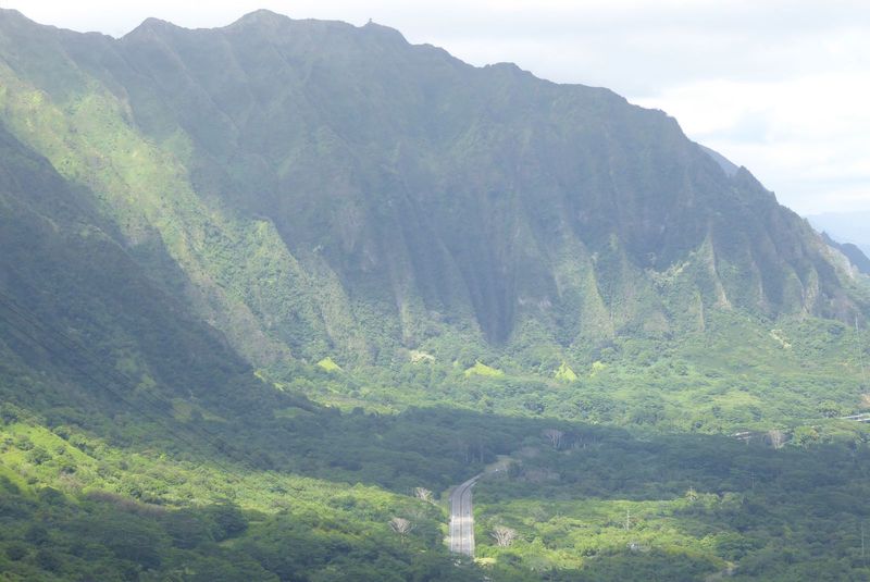 The mountains form a huge barrier crossed by three highways including this one, the Pali or Windward Cliff Highway. The three roads all incl