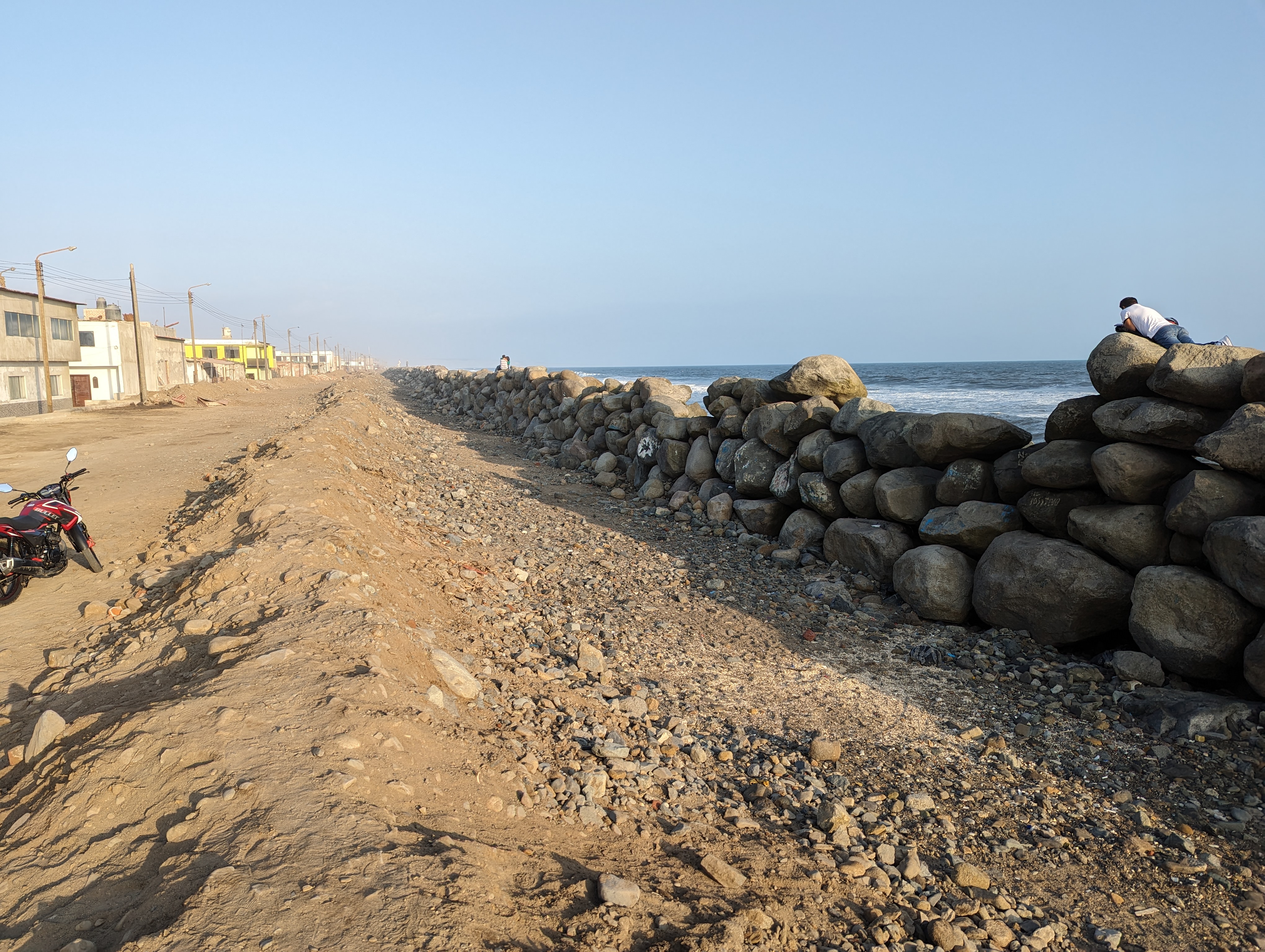 The city has now spread out several miles to the ocean, where the beach is now armored.
