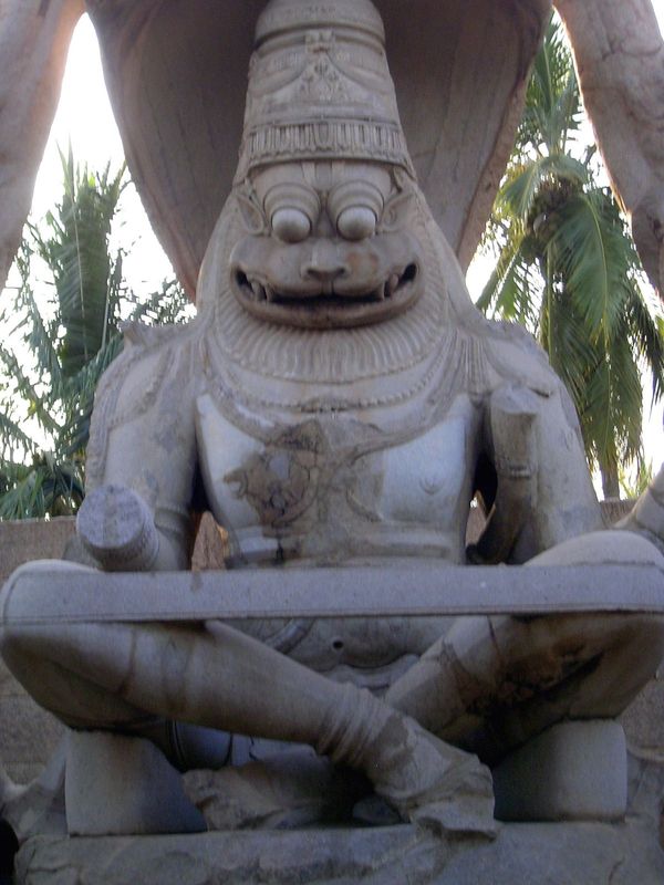 Originally, there was an attached figure of Narasimha's wife, Lakshmi. You can see her arm poking out from more or less under his armpit on 