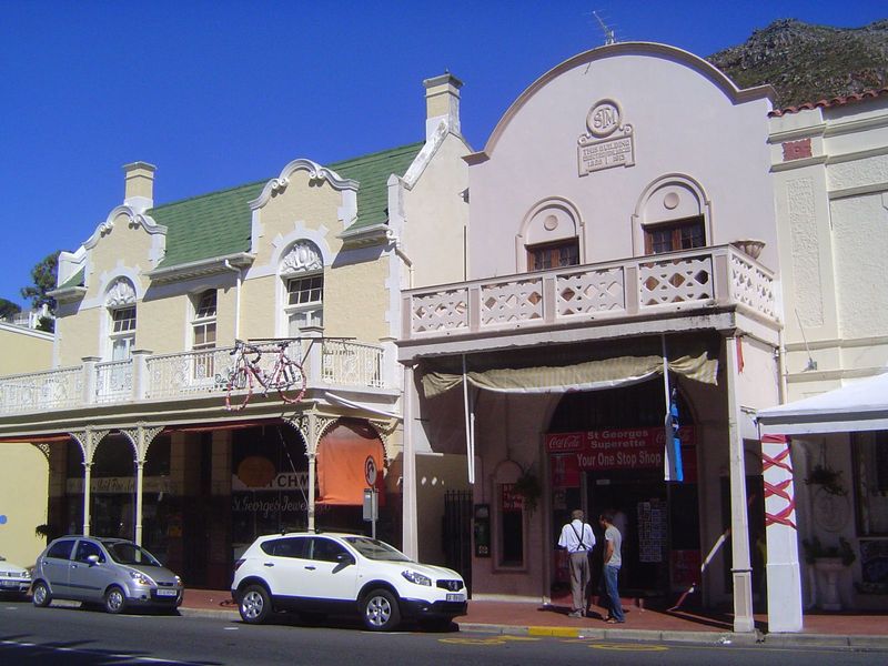The logo stands for Simon's Town Municipality. The building from 1815 to 1893 was a school; from 1913 to 1945 it was the town office, then b