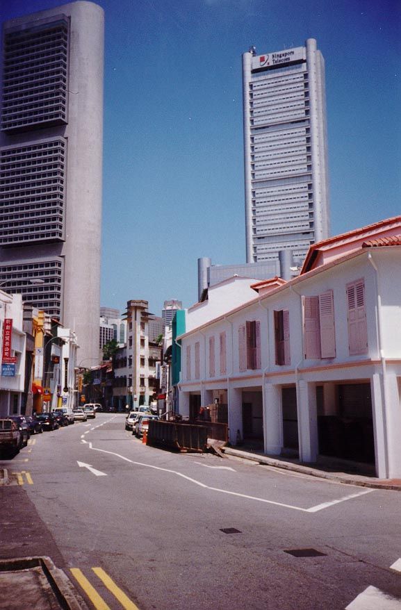 Singapore Telecom above Chinatown shophouses.