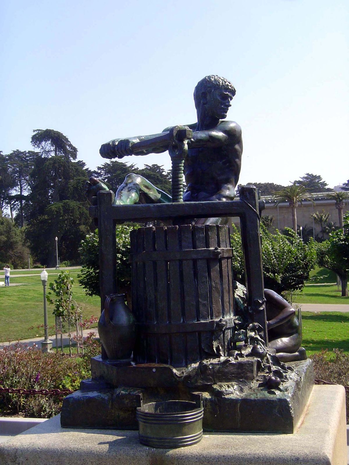 The park had lots of statues, all conservatively figurative. The boy particularly liked this one, which shows an apple presser at work, beca