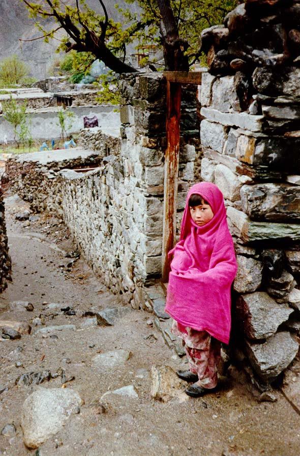 A girl casts a wary eye.