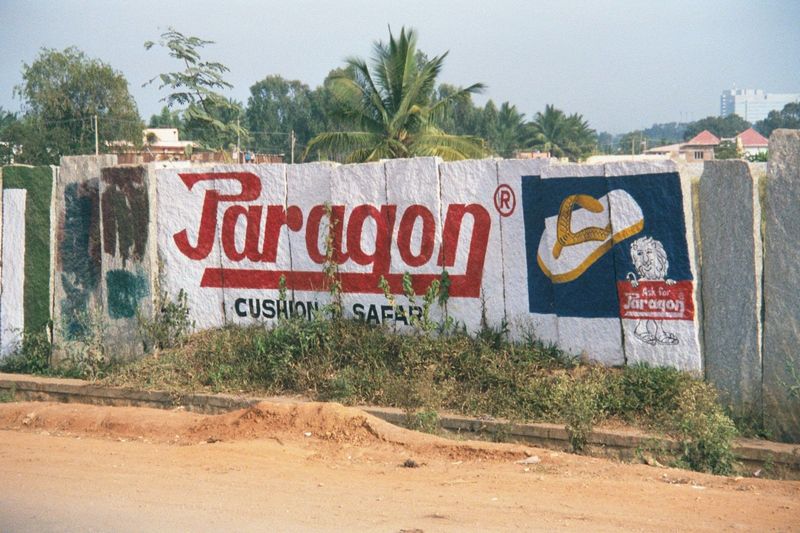 A granite-slab fence becomes a billboard.