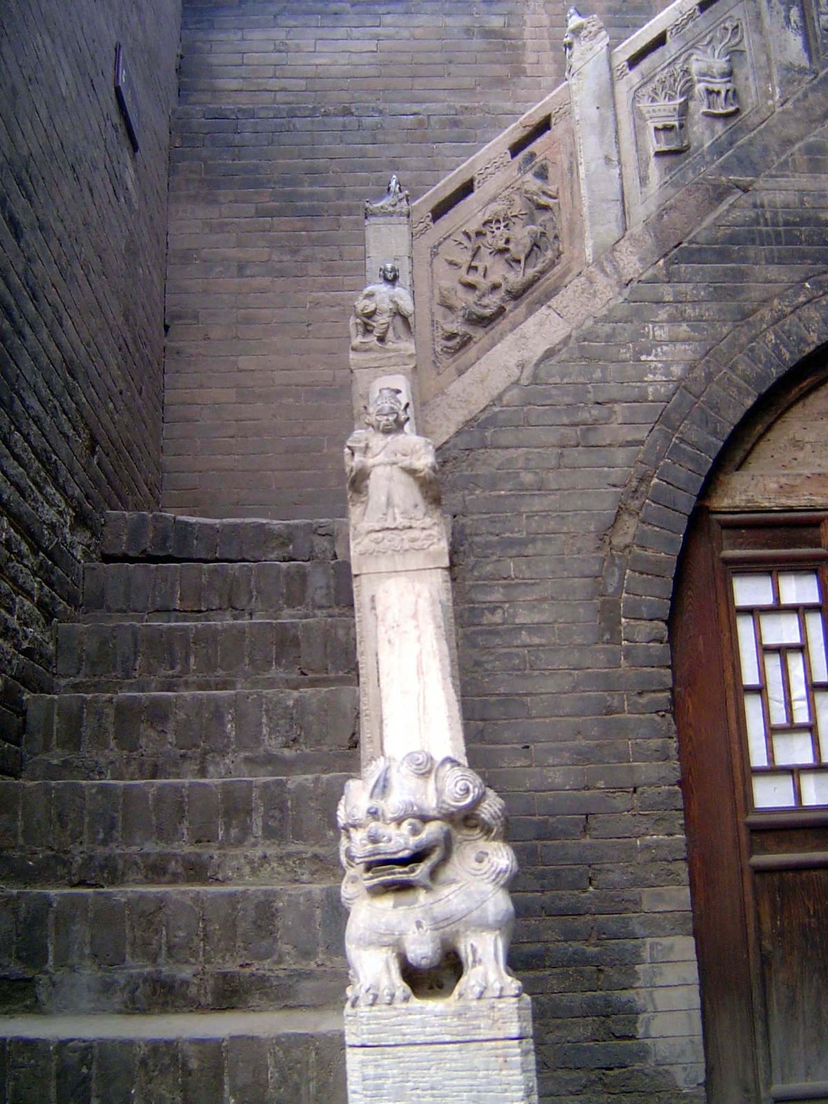 One of the pair of flanking staircases to the upper floor.