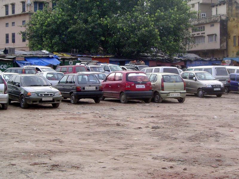 Back a couple of blocks in the crowded city, there's an opening for visitors' cars.