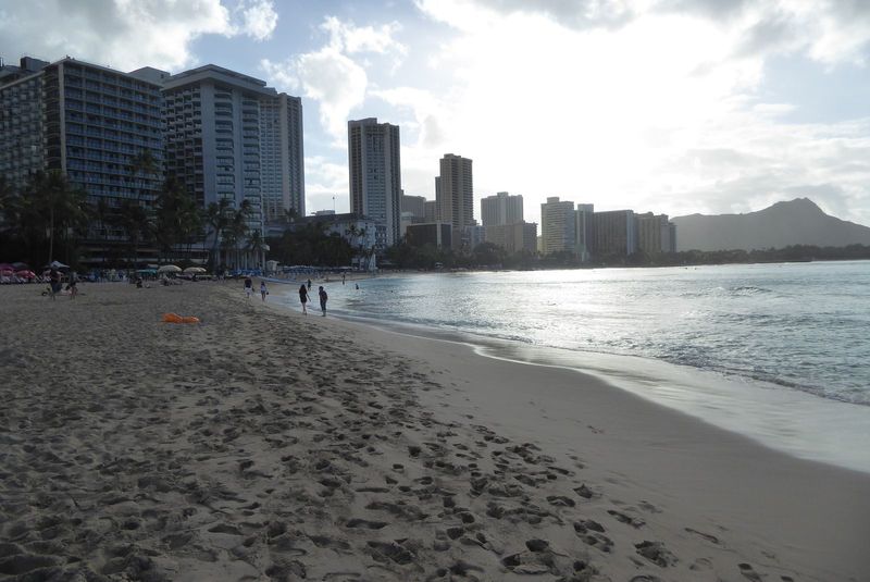 Tired of history? No problem: let's go to the beach. Between here and Diamond Head in the distance you can make out the Halekulani Hotel, th