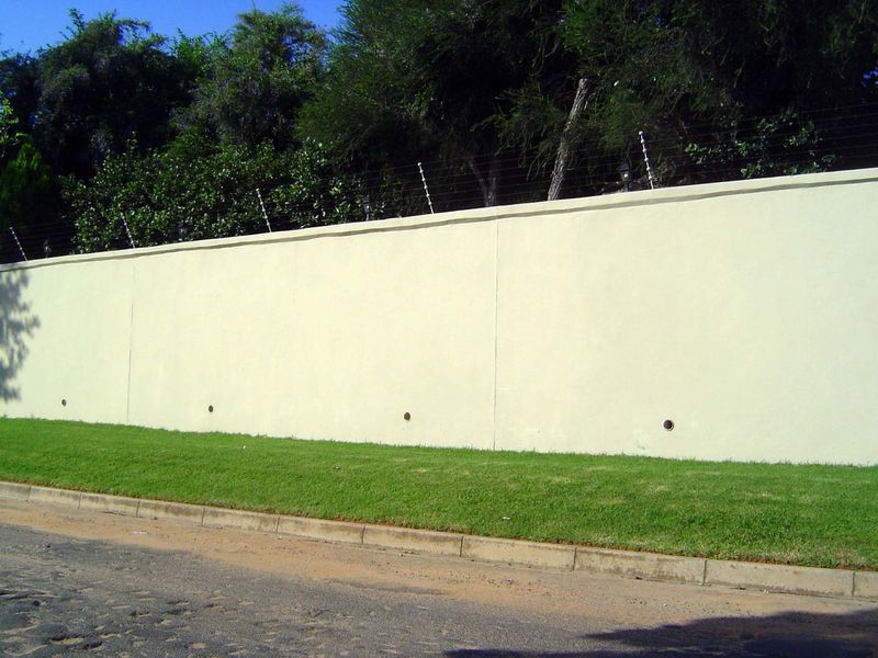 Walls and electric fences are standard.