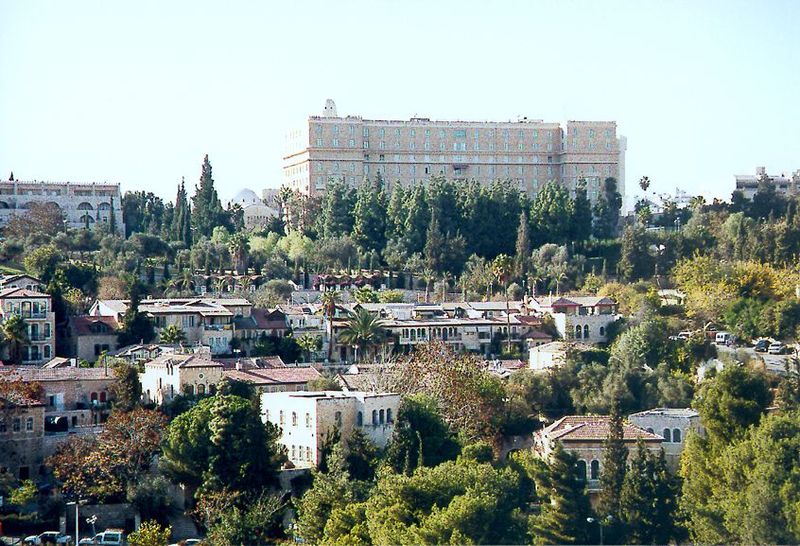 The best-known building along the avenue is the King David Hotel, shown here from the Old City. The hotel rises behind Yemin Moshe, a vestig