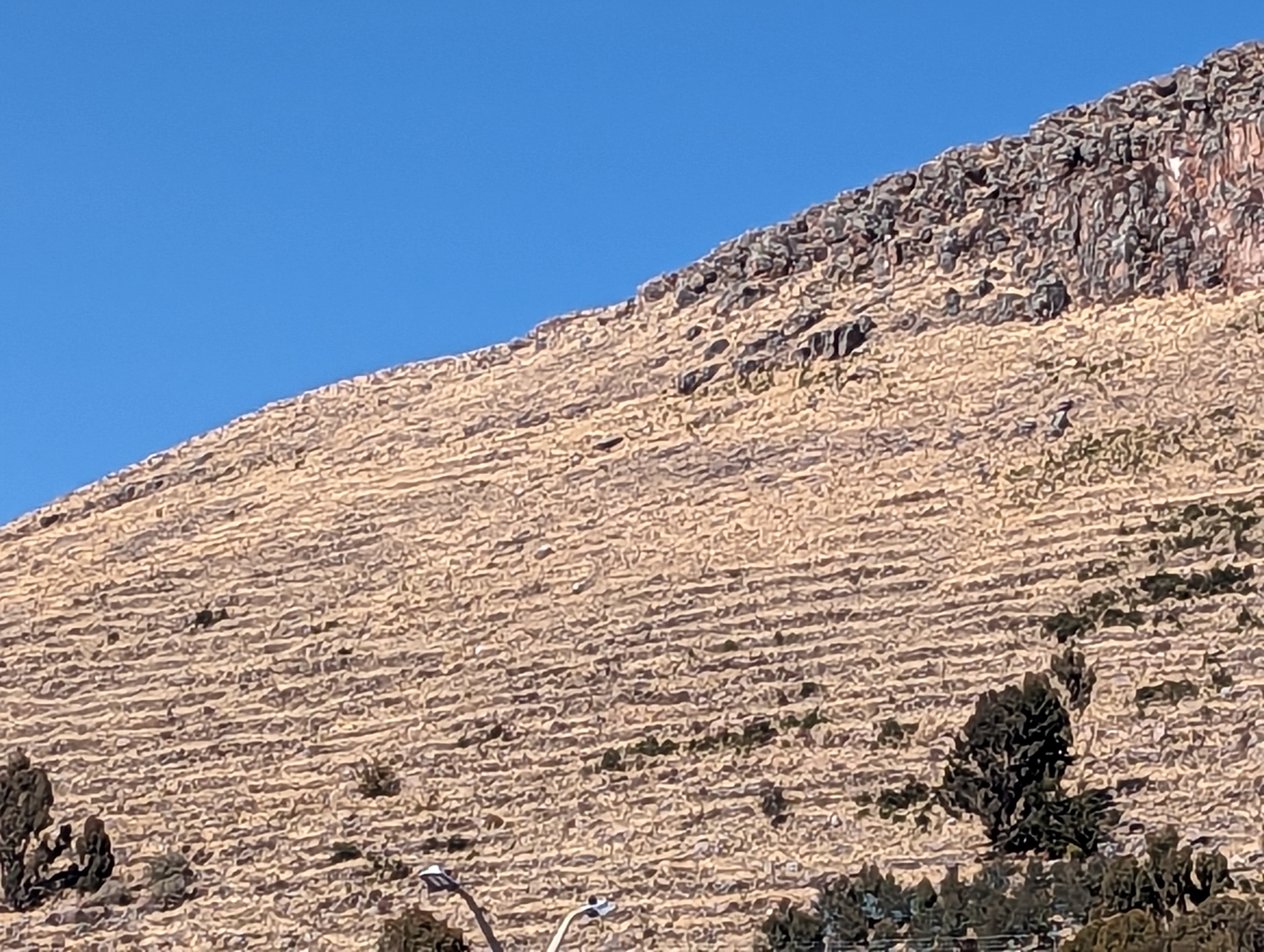The hills continue as terraces.