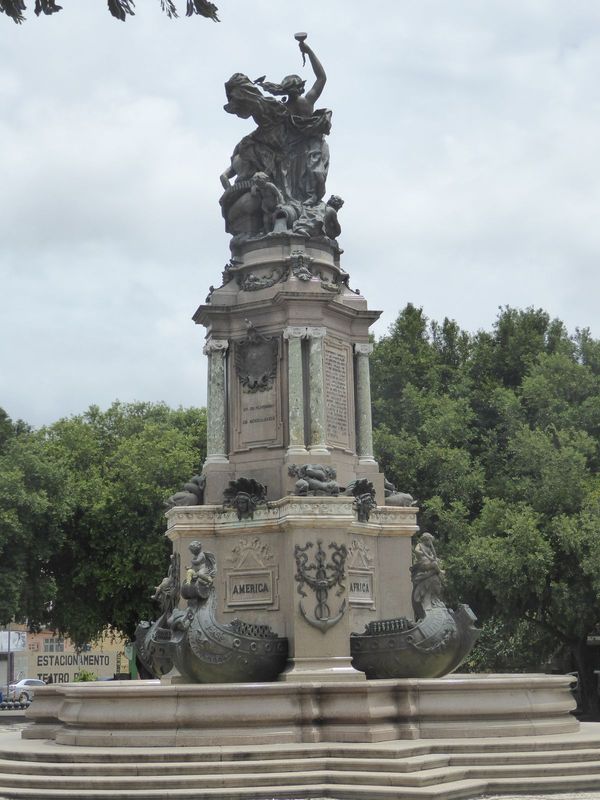 The sculptor was the Italian Domenico de Angelis, who had been working on the opera house. Did he know Bernini's fountain in the Piazza Navo