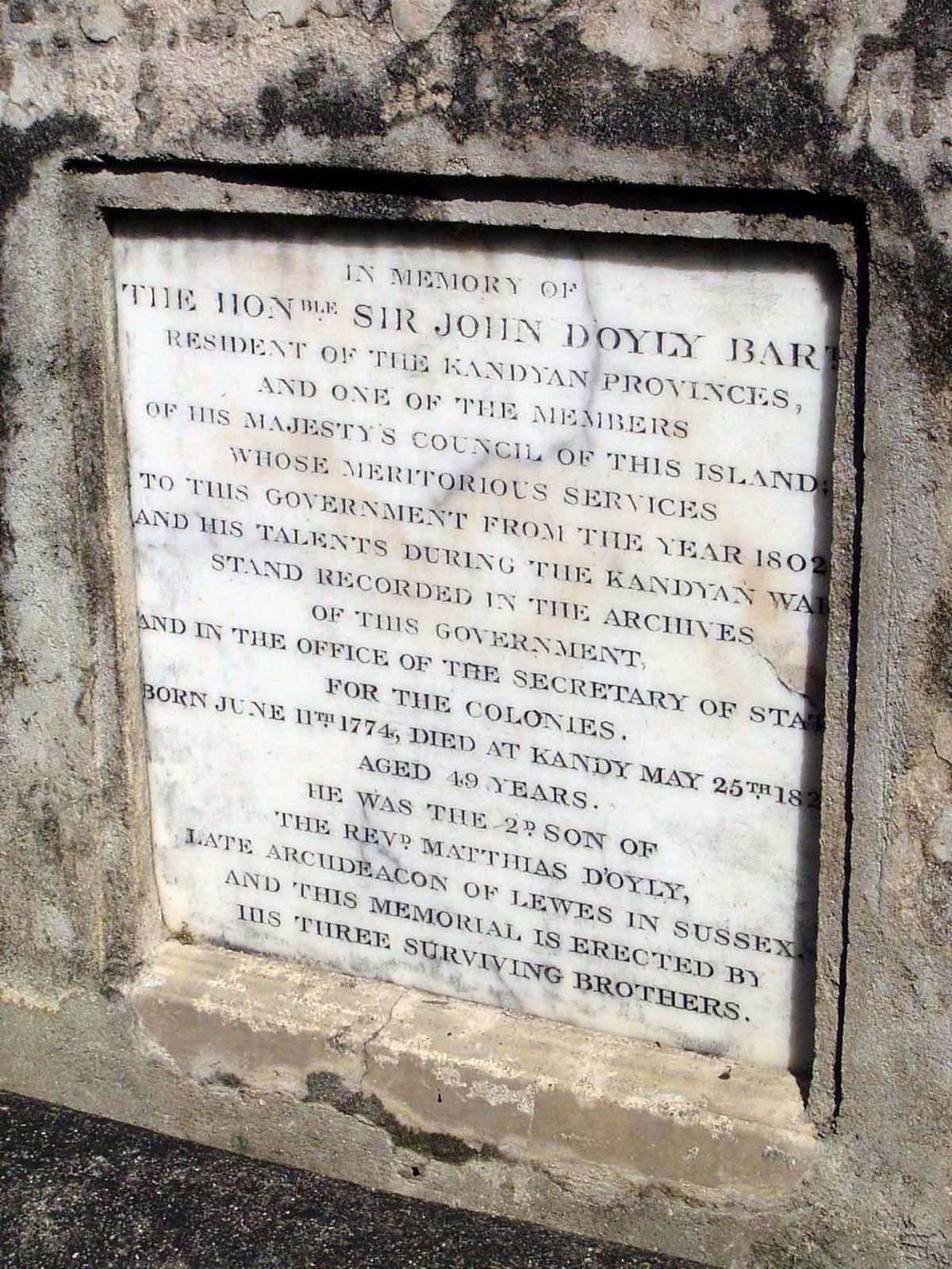 Closeup of the D'Oyly tombstone.