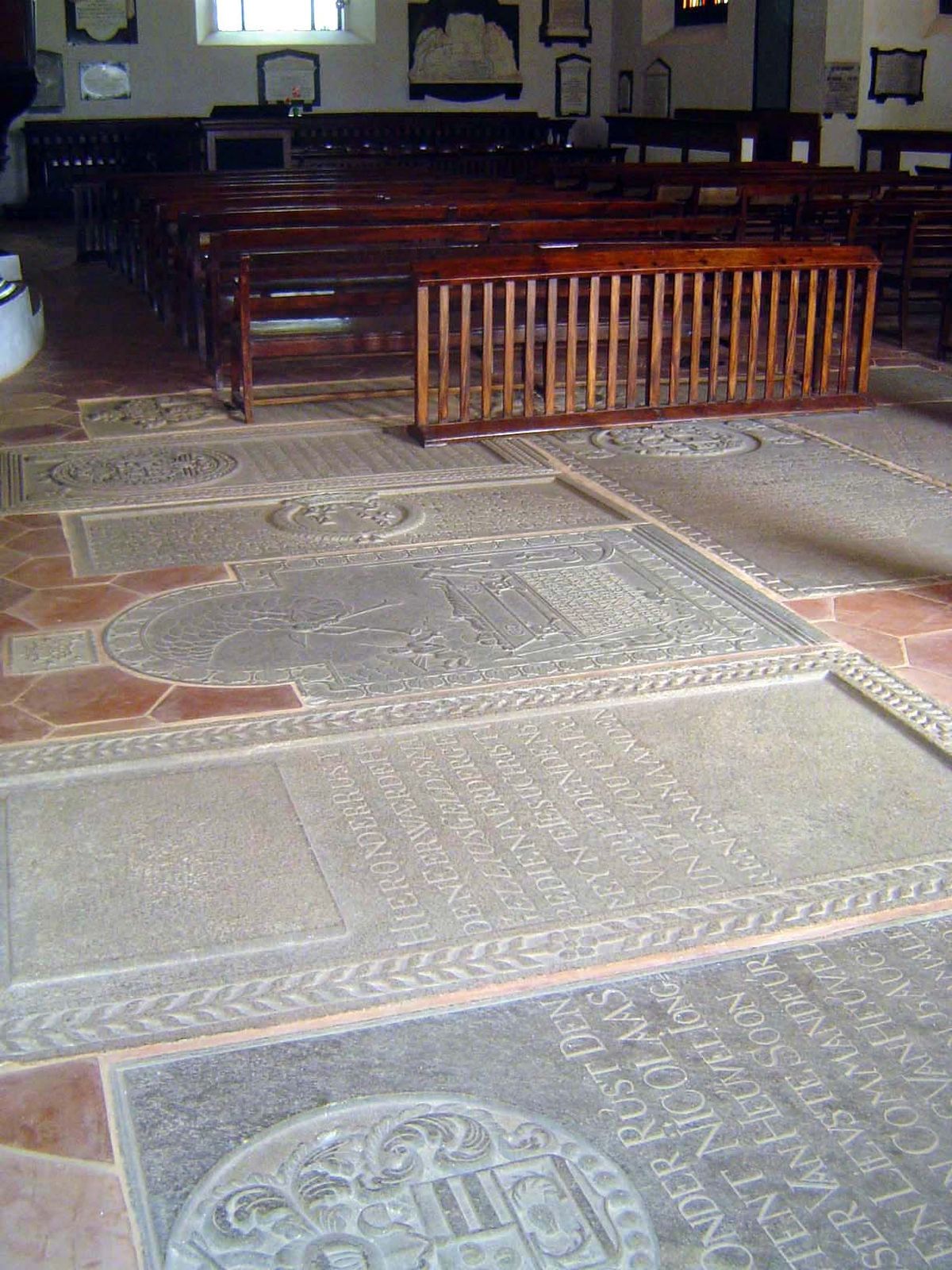 But then you see the floor, into which tombstones have been moved from the nearby cemetery. They're amazingly sharp, unweathered.