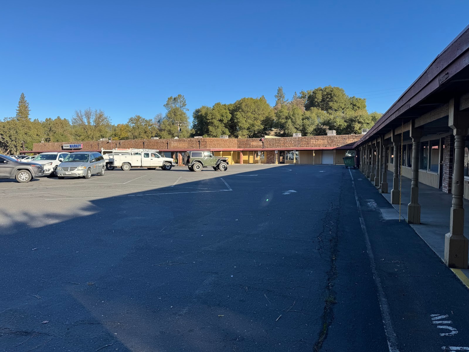 A new shopping center was built, but all the shops have closed.